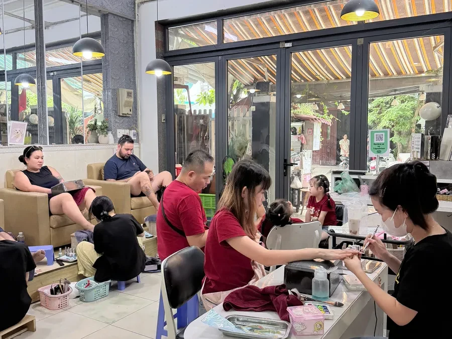 LENA nail salon work stations with clean tools and equipment